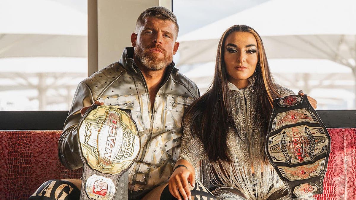 Steve Maclin and Deonna Purrazzo hold title belts