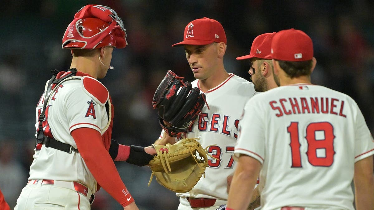 Los Angeles Angels manager Kurt Suzuki making a pitching change