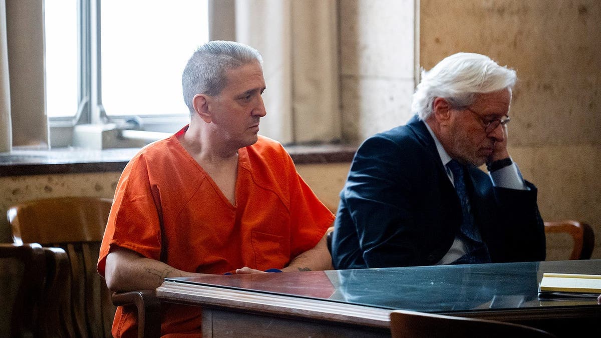 Former decease  enactment      inmate Richard Glossip sits adjacent  to his lawyer   Don Knight