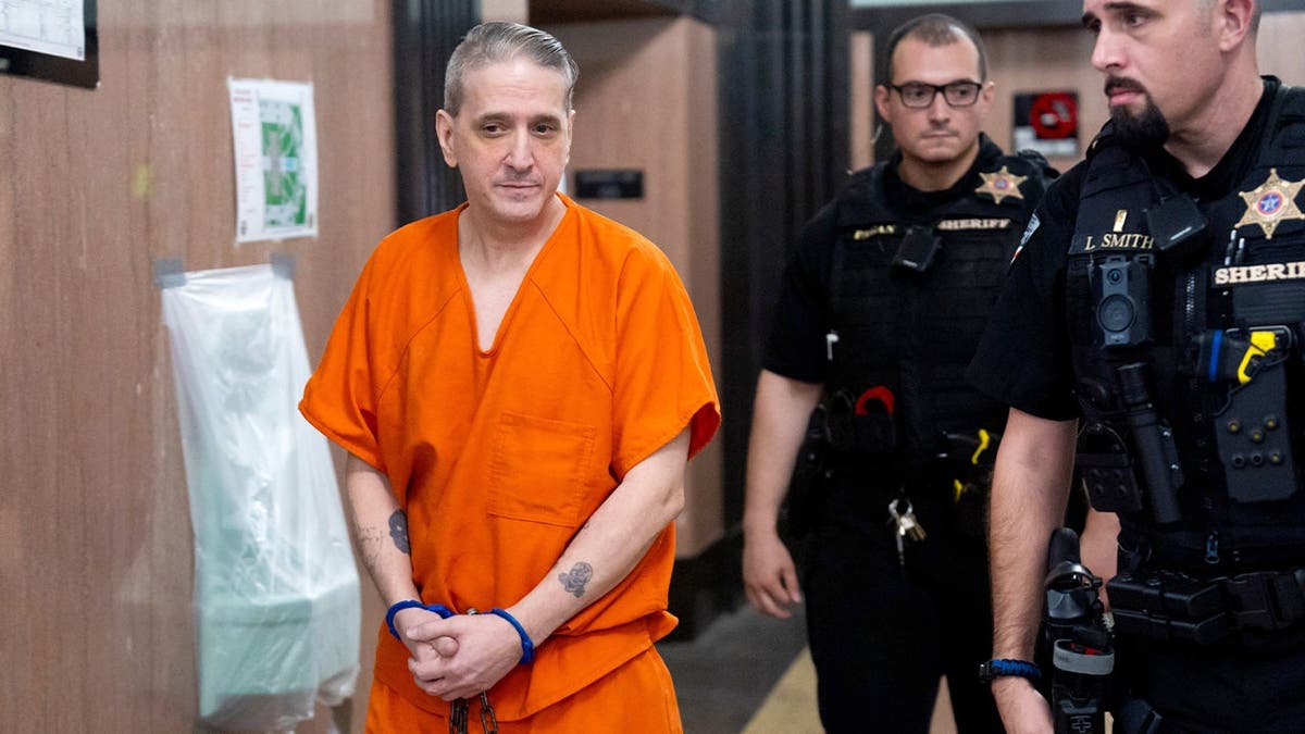 Former decease  enactment      inmate Richard Glossip leaves to an Oklahoma County courtroom