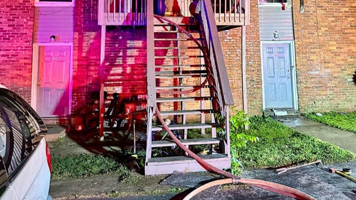 Firefighters fighting a house fire