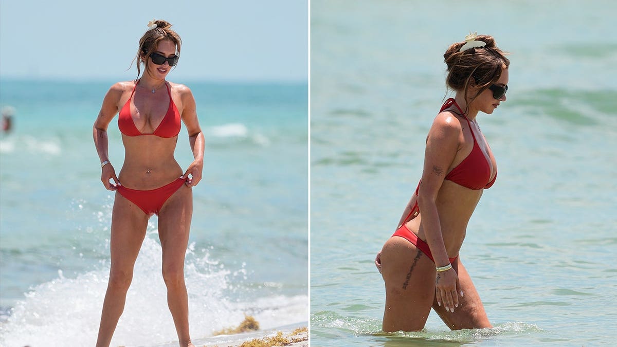 Stassie Karanikolaou wears a red bikini in Miami