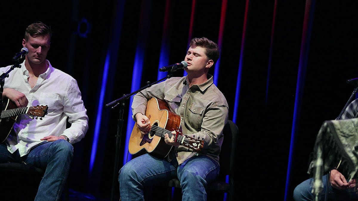 Veteran musicians perform acoustic songs during the 
