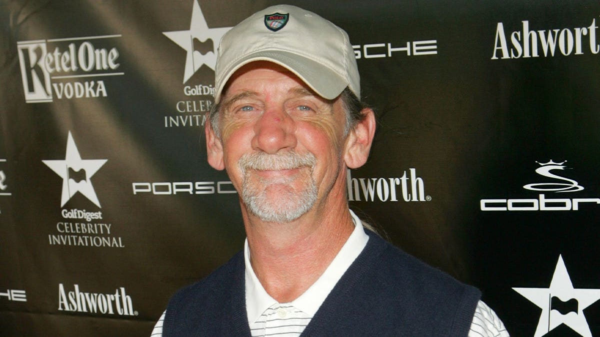Alex Ligertwood attends golf event.