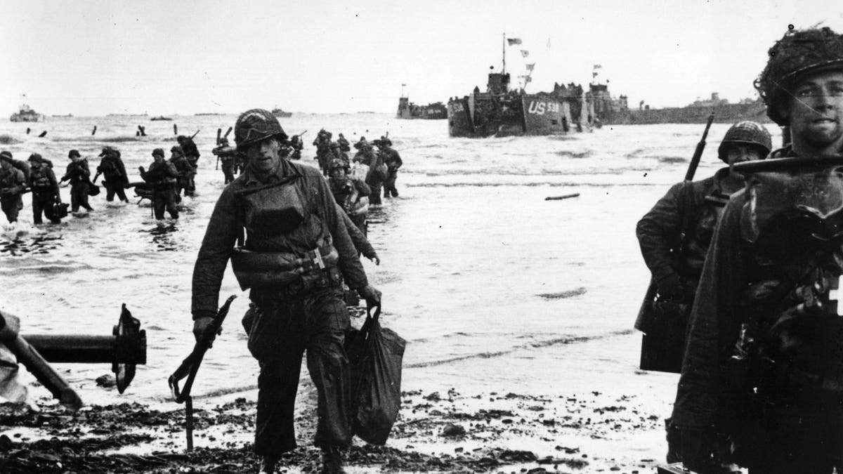 American assault troops wading ashore on Omaha beachhead in Normandy