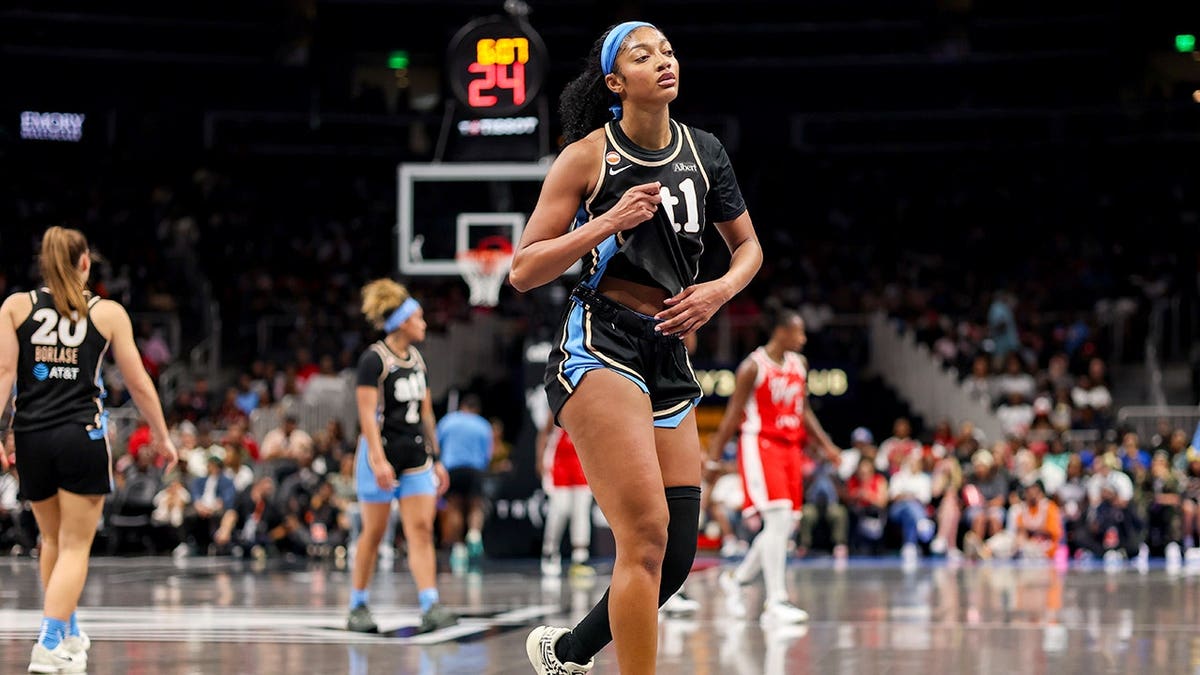 Angel Reese wearing number 5 leaving basketball game at State Farm Arena