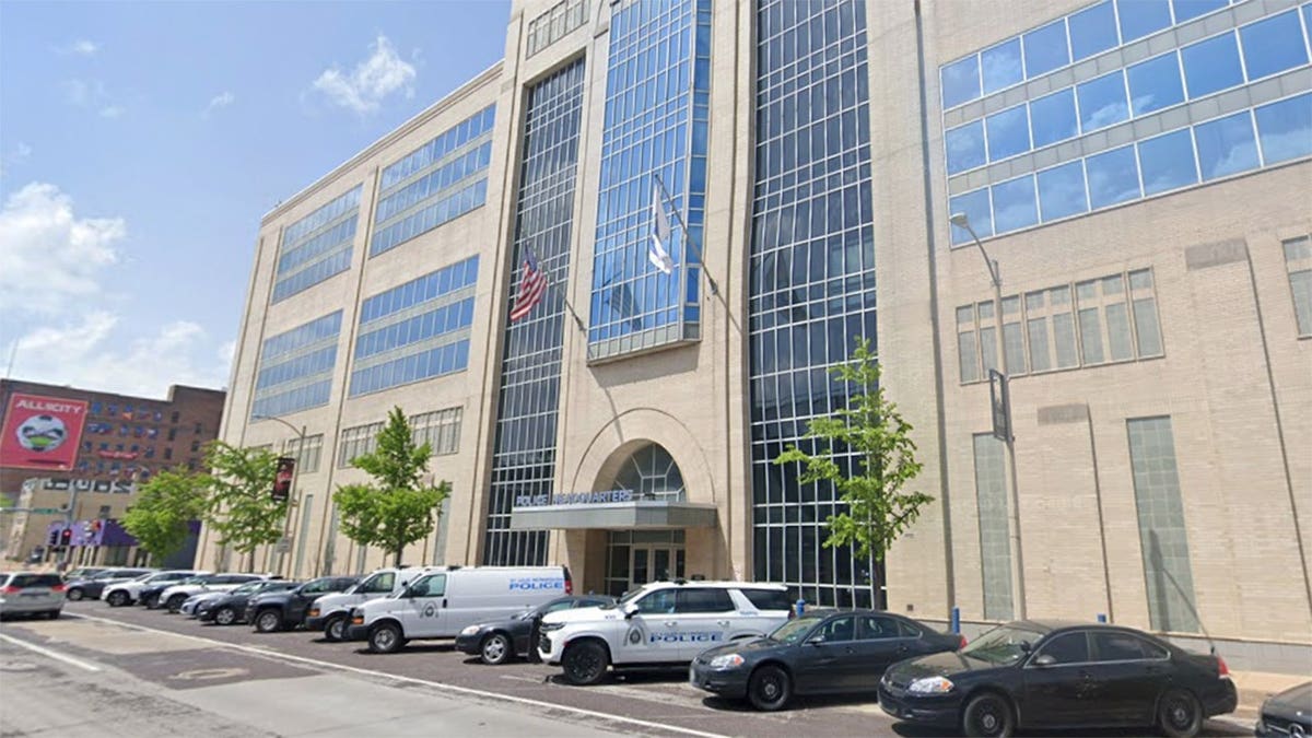 Anthony Lee-Armstrong standing in front of a building