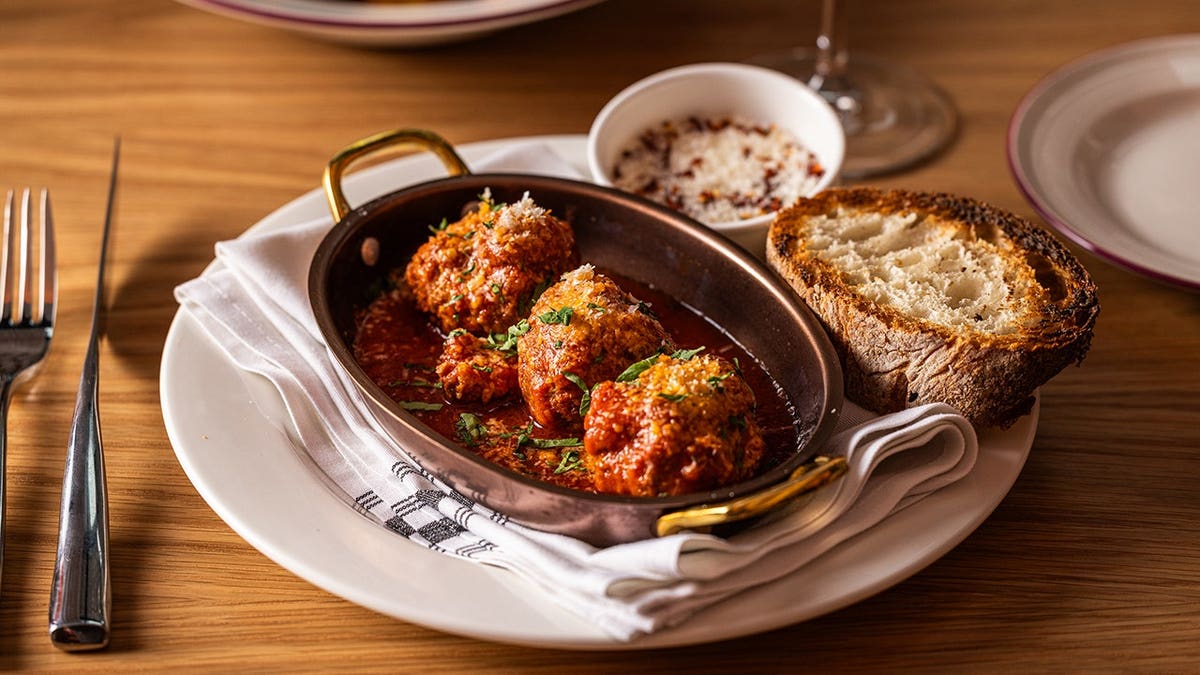 meatballs on a plate next to bread served at Bar Rocco