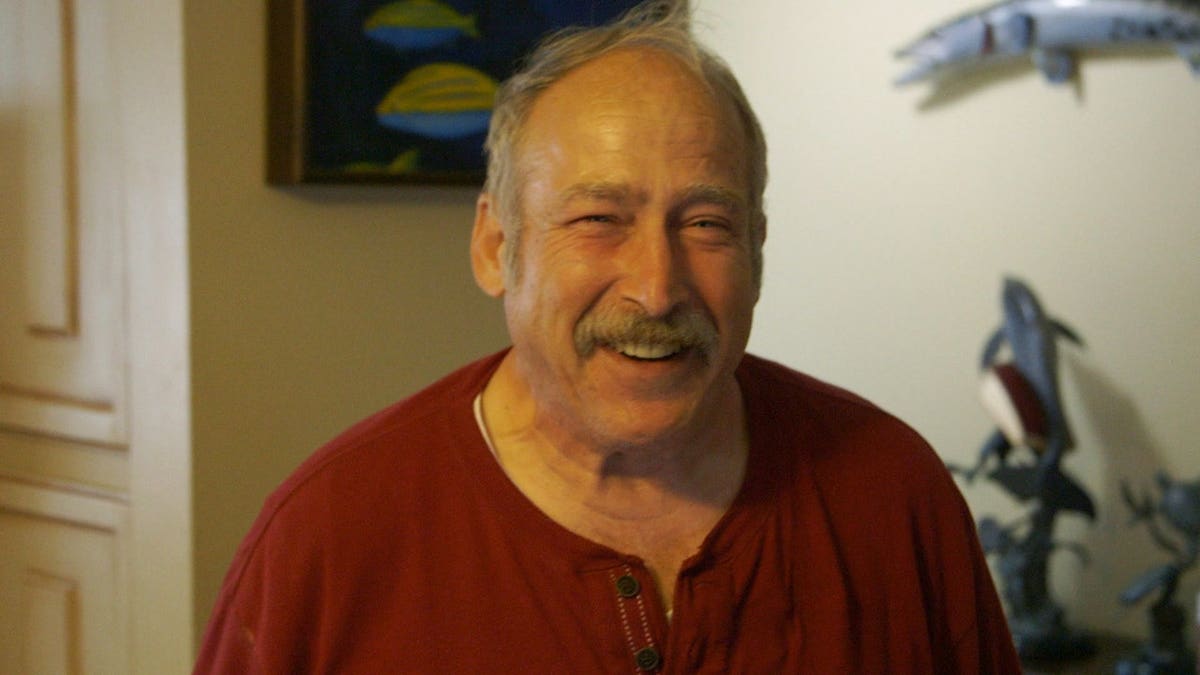 Benjaman Kyle smiling and looking at the camera