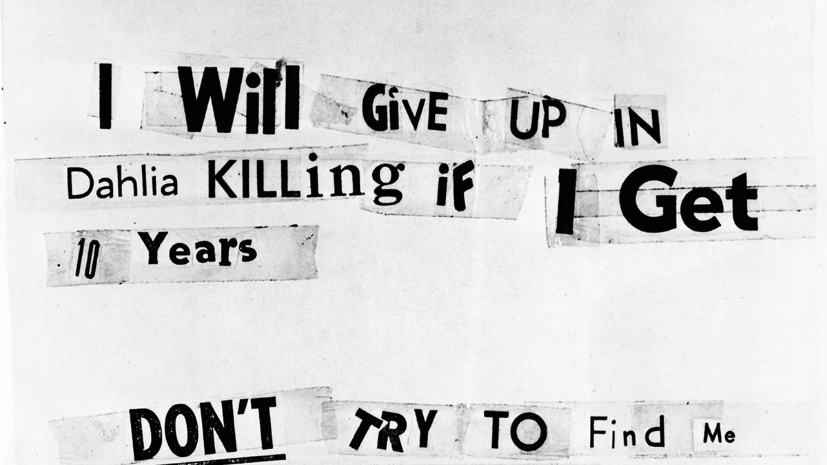 A achromatic  and achromatic  photograph  showing a enactment      written with paper  clippings that says 