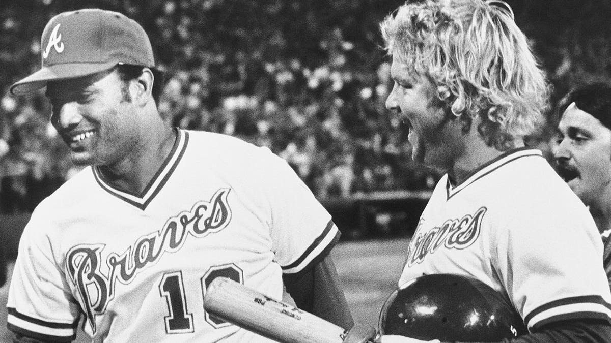 Atlanta Braves skipper Bob Horner celebrating with teammate Chris Chambliss astatine Atlanta-Fulton County Stadium