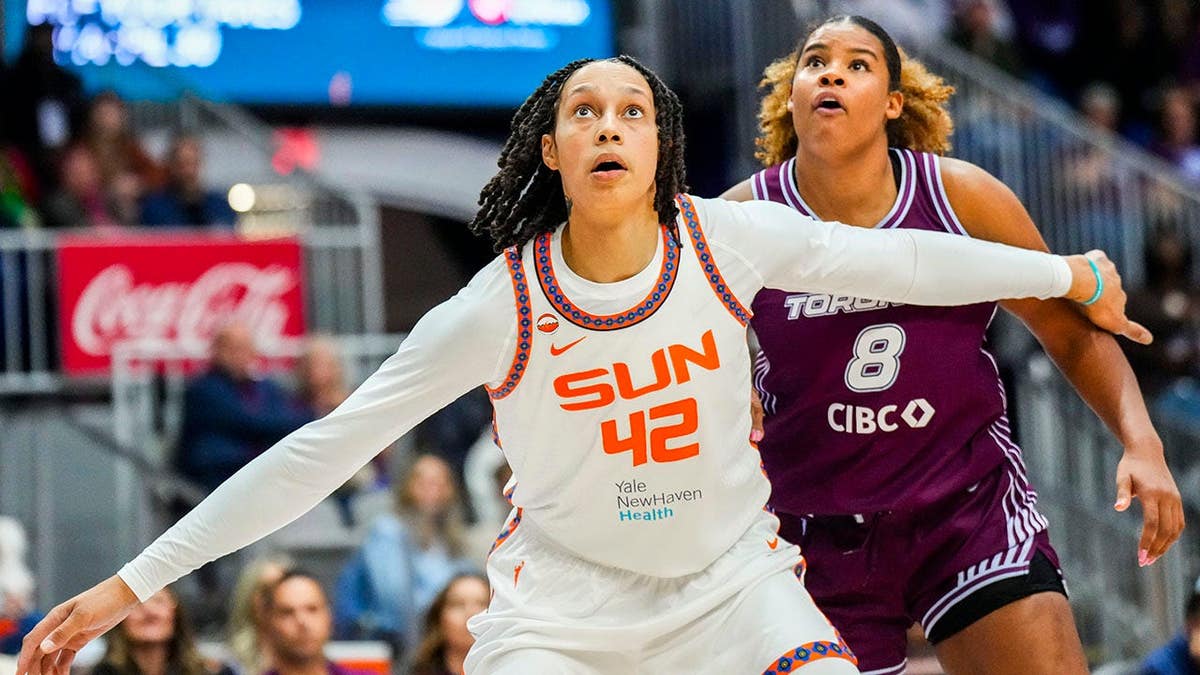 Connecticut Sun center Brittney Griner boxing out Toronto Tempo center Nyara Sabally at Coca-Cola Coliseum