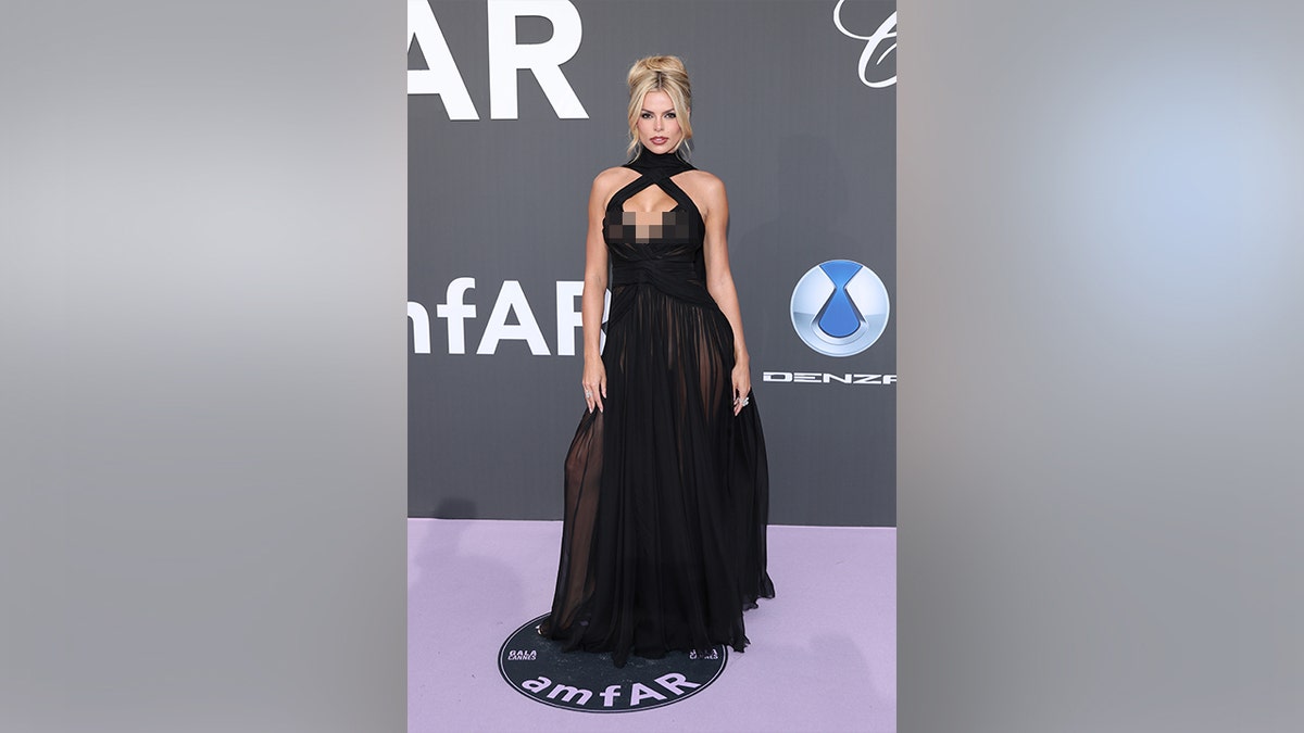 Brooks Nader at the Cannes Film Festival in a sheer dress in May 2026.