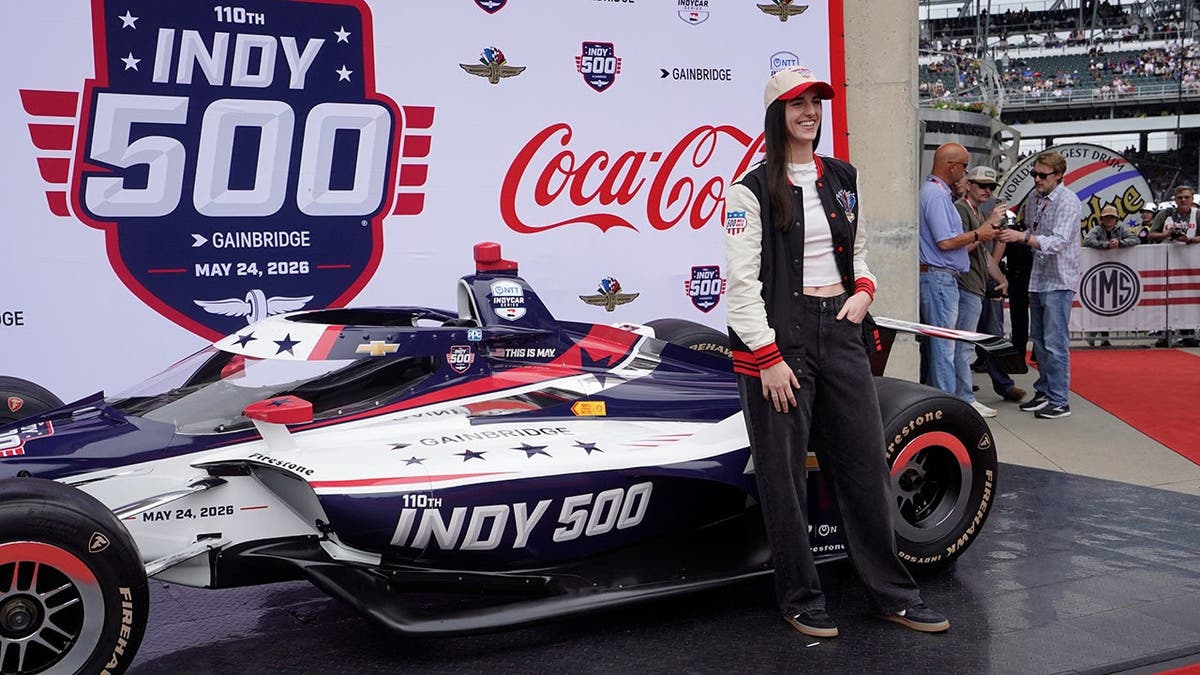 WNBA player Caitlin Clark walking the red carpet at Indianapolis Motor Speedway