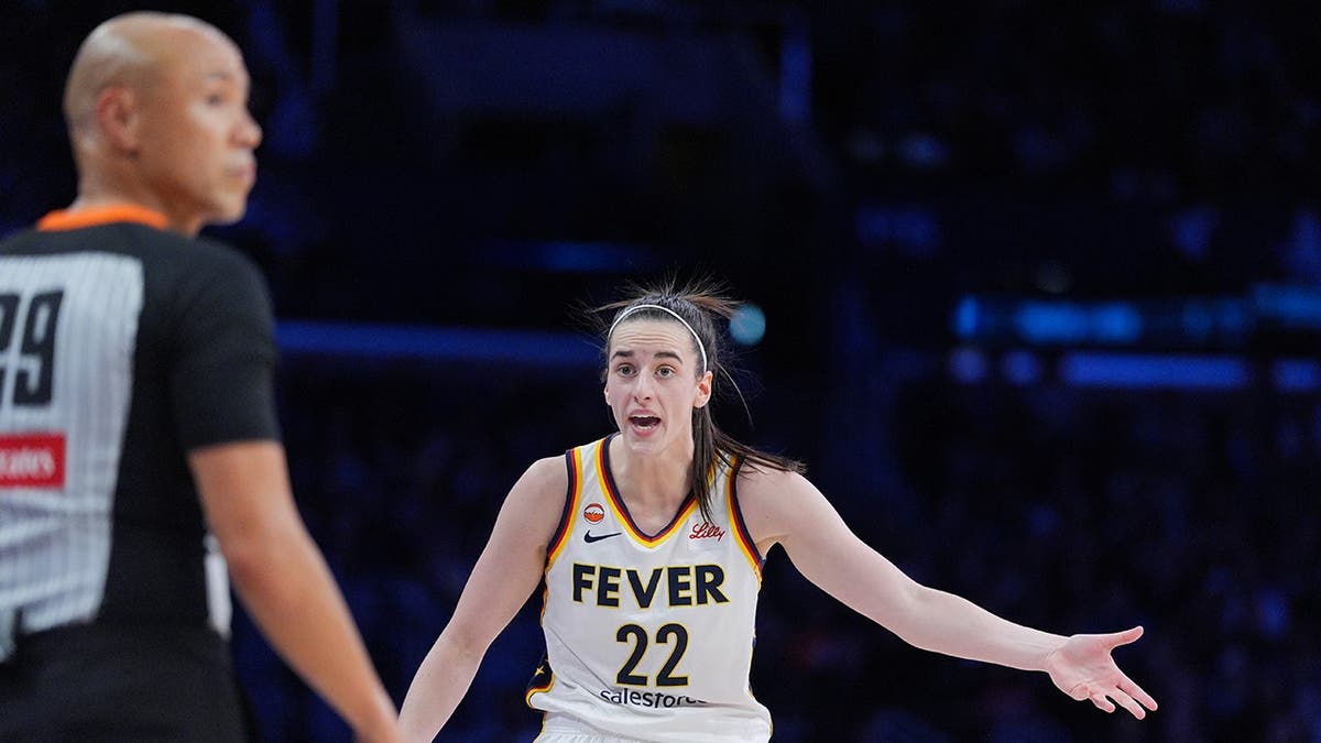 Indiana Fever guard Caitlin Clark reacting during a WNBA game in Los Angeles