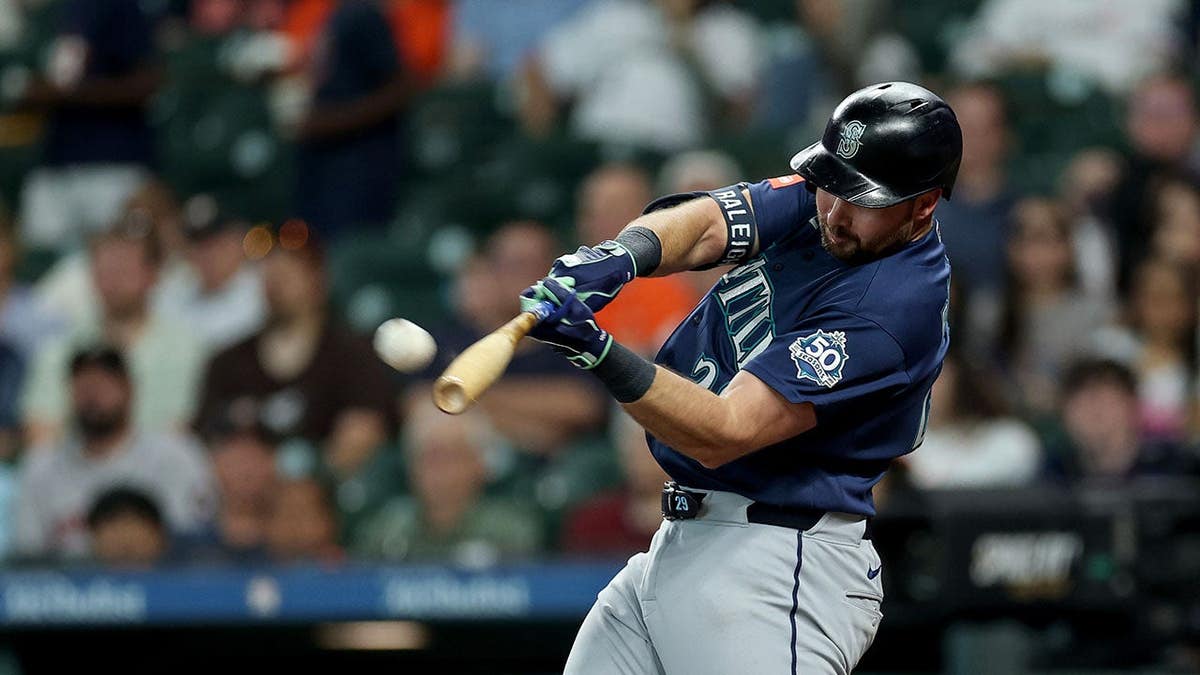 Cal Raleigh batting for the Seattle Mariners astatine  Daikin Park successful  Houston, Texas.