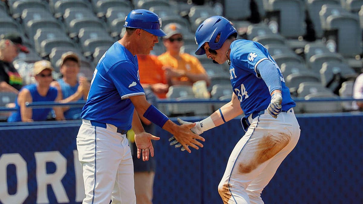 Kentucky outfielder Carson Hansen celebrating a home run at Hoover Metropolitan Stadium