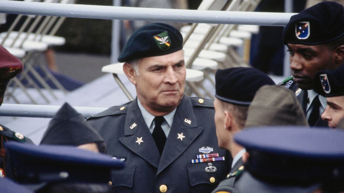 Colonel Charles Beckwith in military uniform posing for a portrait