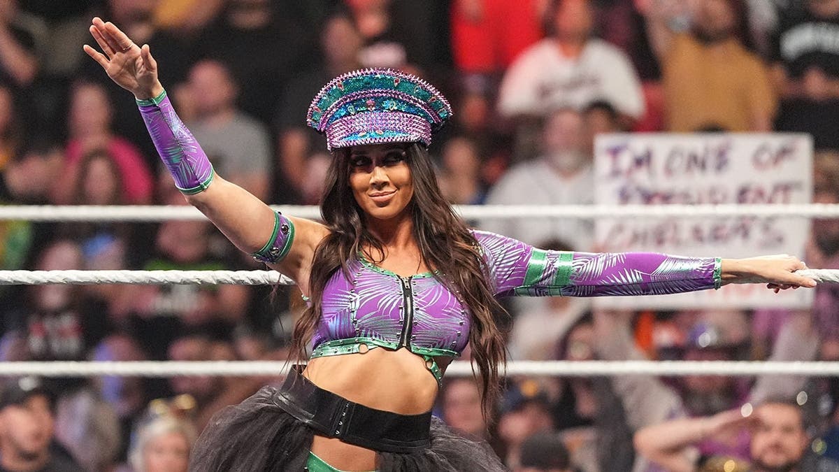 Chelsea Green entering the wrestling ring at Little Caesars Arena in Detroit