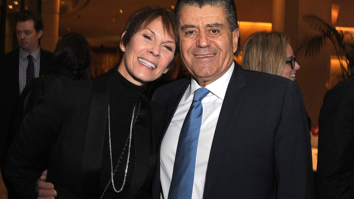 Cheryl Saban and Haim Saban standing together at an event in Beverly Hills