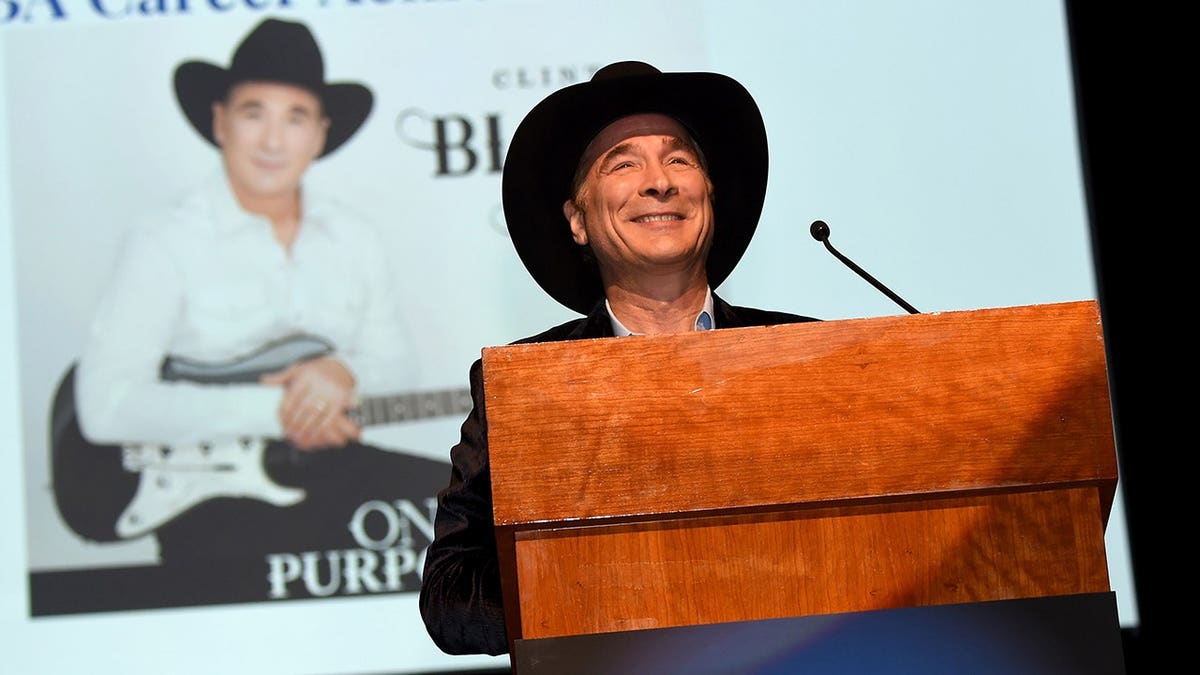 Clint Black accepting Career Achievement Award at IEBA conference in Nashville