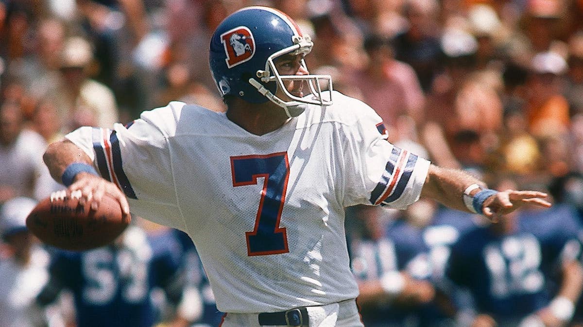 Denver Broncos backmost Craig Morton throwing a walk during a preseason crippled astatine Mile High Stadium