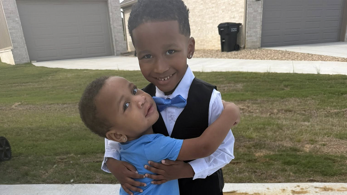 Dax Barnes and Dyce Love, the young brothers who died in the Arkansas crash, were pictured hugging outside