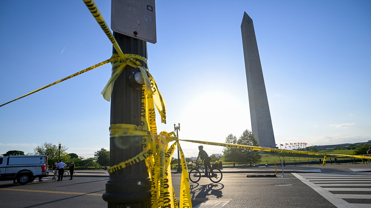 Police tape around scene near Washington Monument after person shot by law enforcement