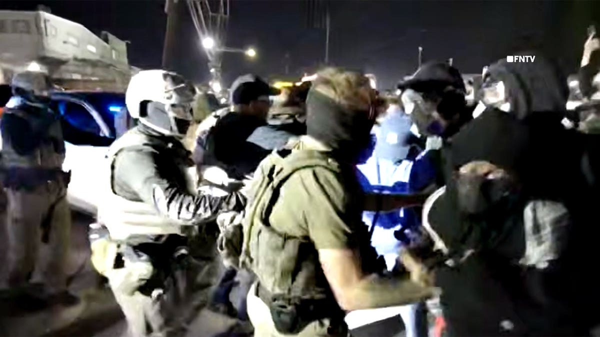 Federal agents clash with anti-ICE agitators outside Delaney Hall in Newark, N.J.