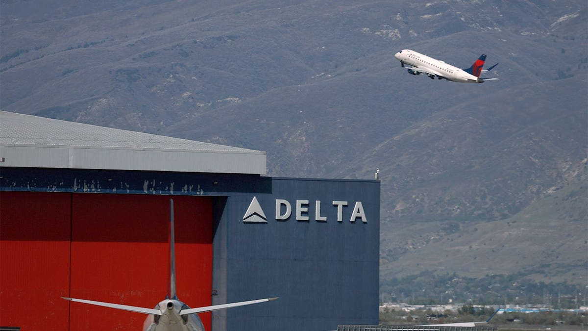 A Delta Airlines plane taking off from Salt Lake City International Airport.