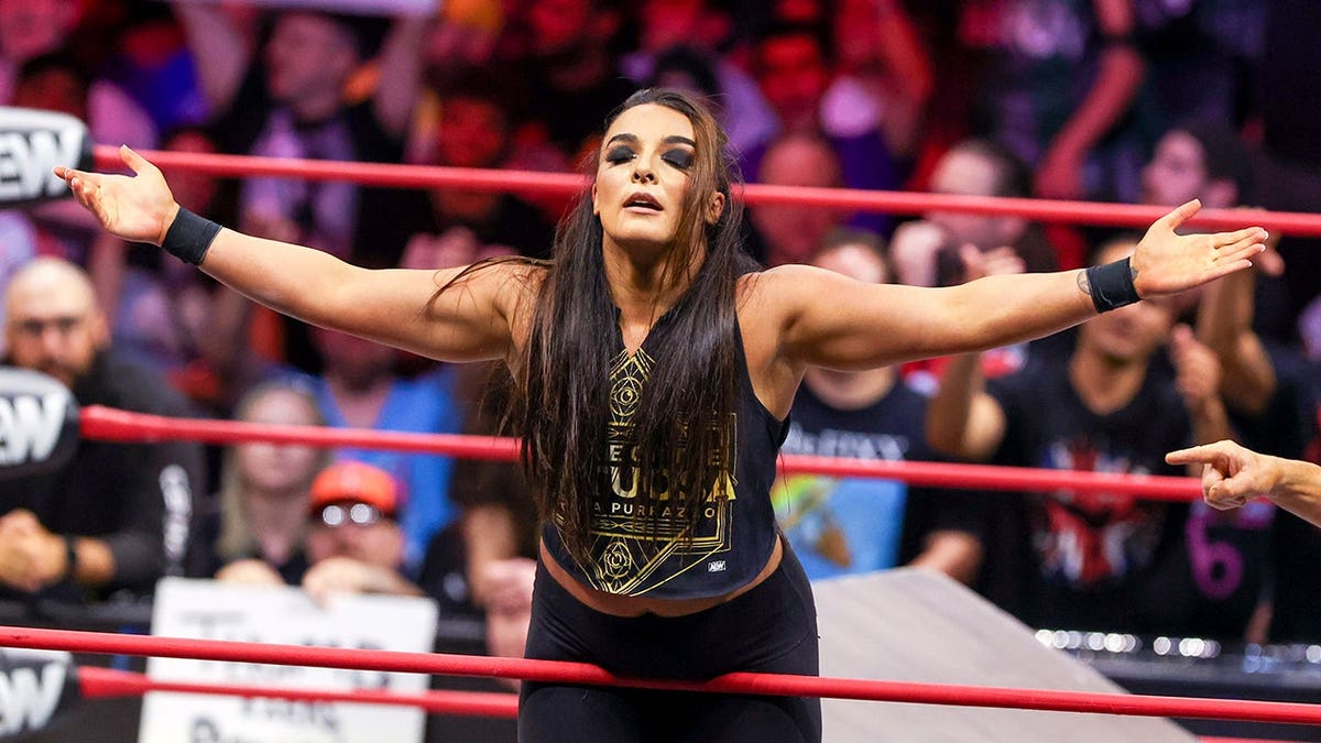 Deonna Purrazzo celebrating after winning a wrestling match at the Covelli Centre in Youngstown, Ohio
