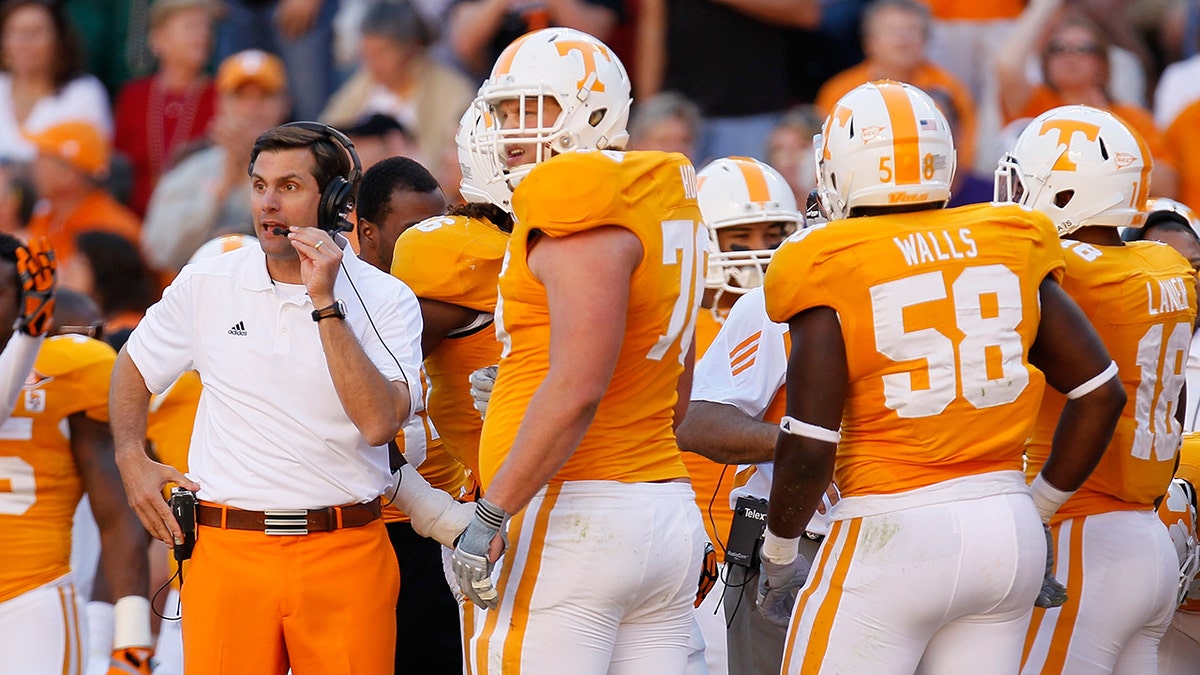 Derek Dooley coaches a Tennessee game
