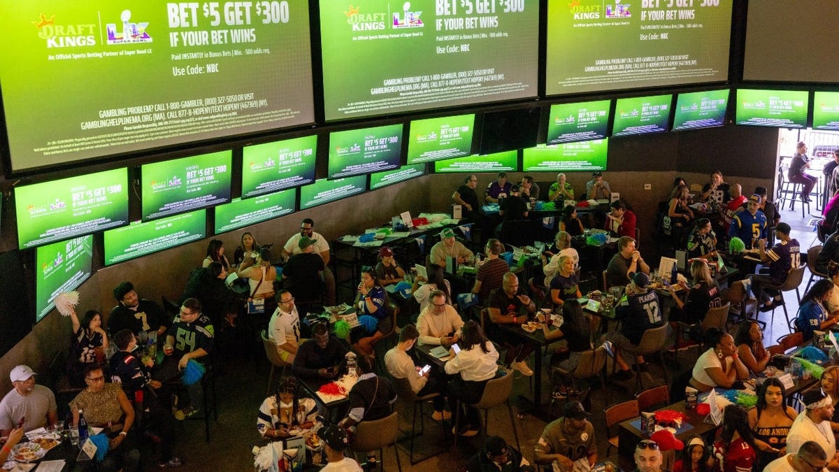A Draftkings commercial playing on a television at a bar in Los Angeles