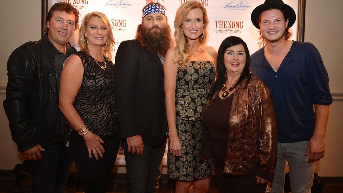 Al and Lisa Robertson, Willie and Korie Robertson, and Kay Robertson arriving at a movie premiere in Franklin, Tennessee