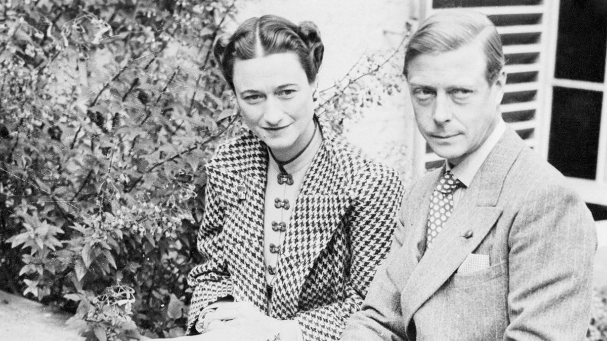 The Duke of Windsor and Duchess Wallis Simpson standing outside a home in Ashdown Forest Sussex England
