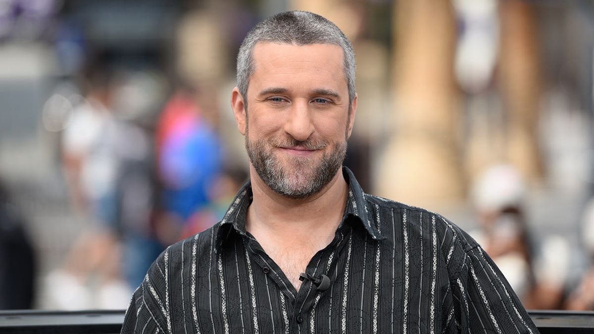 Dustin Diamond visiting Extra at Universal Studios Hollywood in Universal City, California