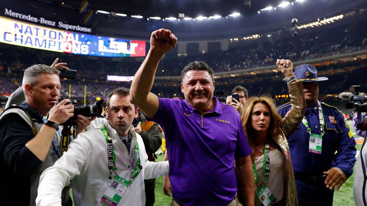 Head coach Ed Orgeron of LSU Tigers celebrating on field