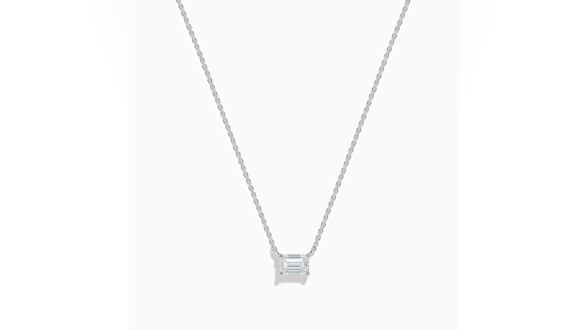 This uniquely-shaped pendant puts a spin on the typical diamond necklace. 