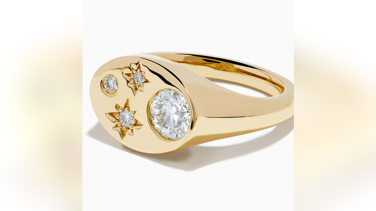 Lab-grown diamonds are nestled prettily in this 14K yellow gold celestial-inspired ring.
