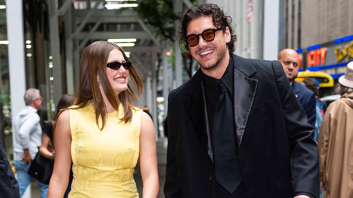Ella Bright and Belmont Cameli walking