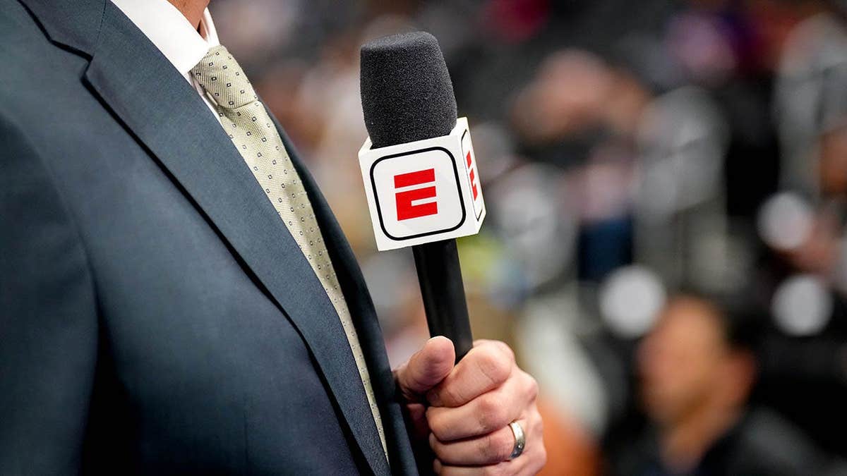 A detailed view of the ESPN logo on a microphone at Little Caesars Arena