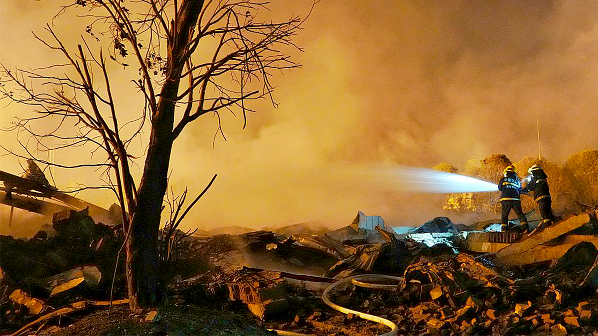 Fire rescue forces carry out rescue operations after an explosion at a fireworks plant