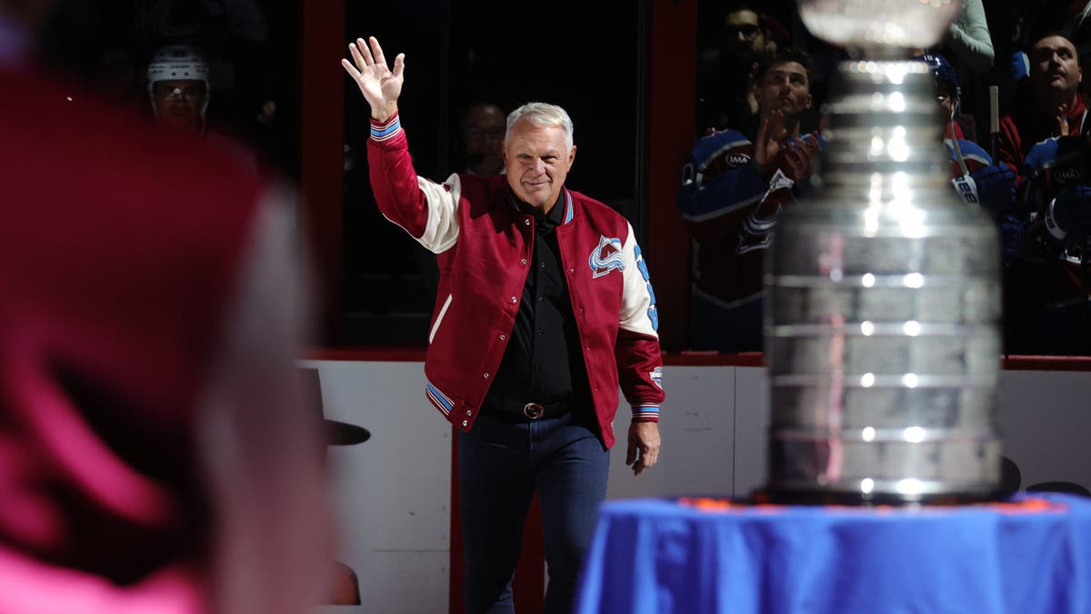 Claude Lemieux acknowledges the crowd during a ceremony