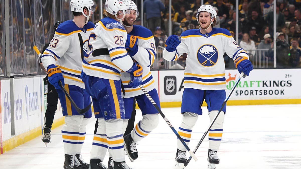 BOSTON, MASSACHUSETTS - MAY 01:  Josh Norris #9 of the Buffalo Sabres is congratulated by his teammates after scoring an empty-net goal against the Boston Bruins during the third period in Game Six of the First Round of the 2026 Stanley Cup Playoffs at TD Garden on May 01, 2026 in Boston, Massachusetts.  (Photo by Bruce Bennett/Getty Images)
