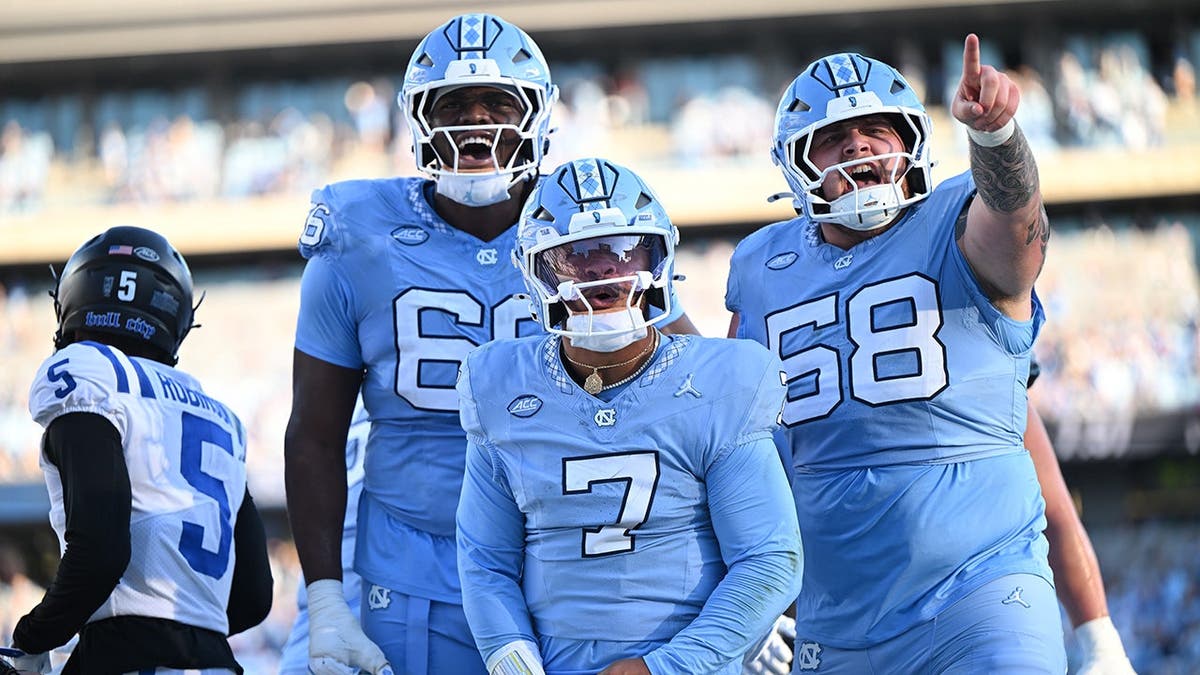 North Carolina Tar Heels quarterback Gio Lopez celebrating a touchdown at Kenan Stadium