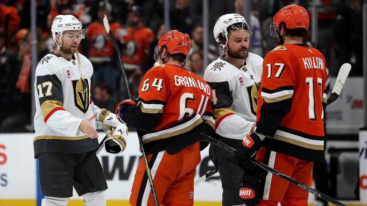 Golden Knights and Ducks shaking hands