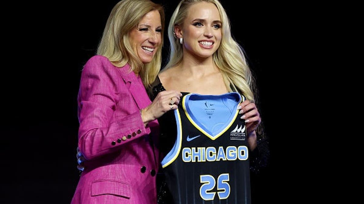 Hailey Van Lith posing with WNBA Commissioner Cathy Engelbert at the 2025 WNBA Draft in New York City