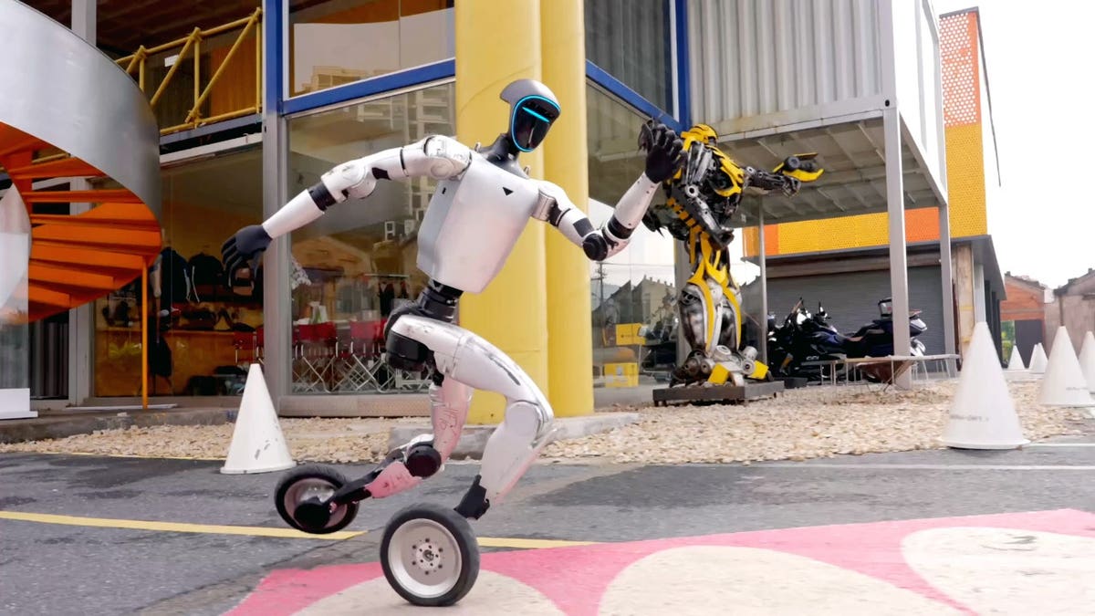 A humanoid robot moves on wheels.