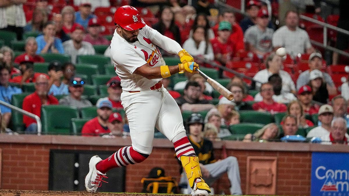 St. Louis Cardinals' Ivan Herrera hitting a location tally during a shot game.