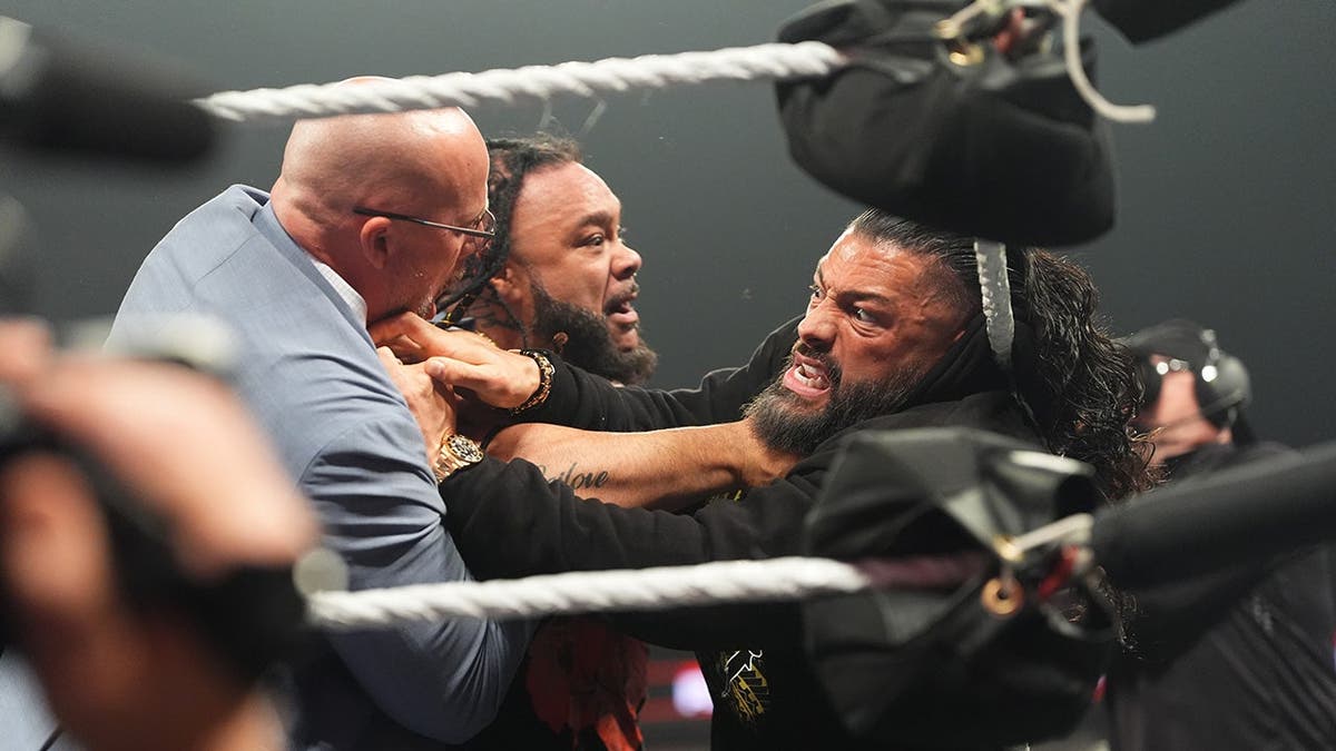 Jacob Fatu attacks Roman Reigns during Monday Night RAW at CHI Health Center in Omaha, Nebraska
